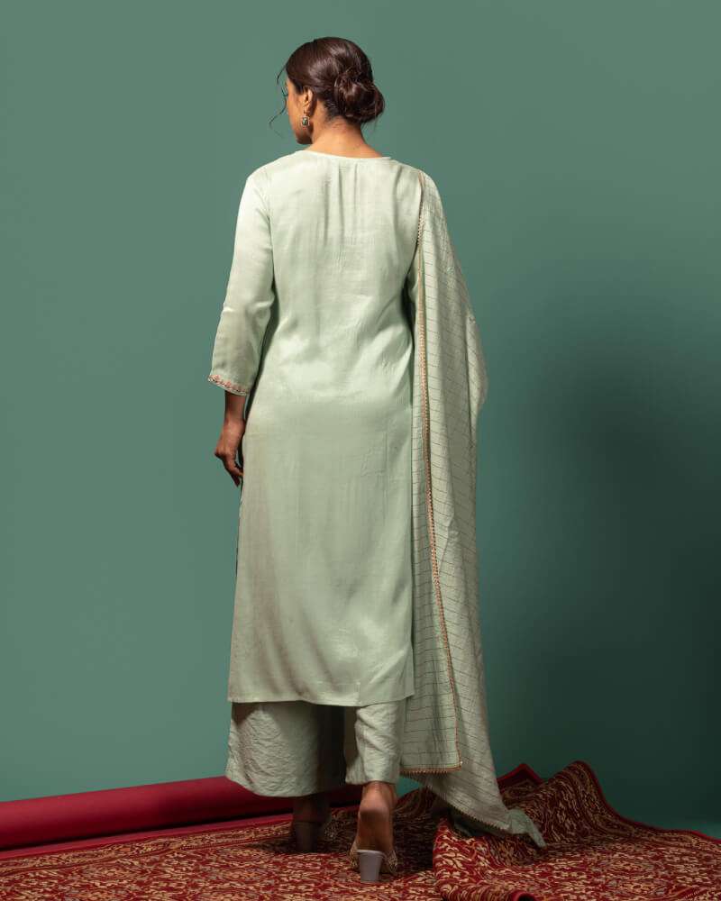 Sage green kurta set.