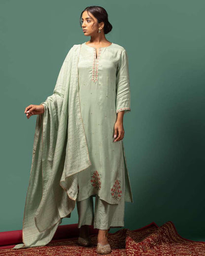 Sage green kurta set.