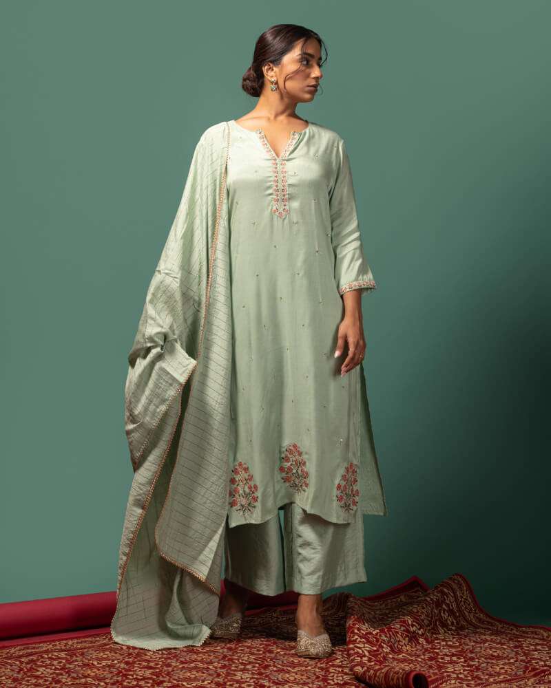 Sage green kurta set.